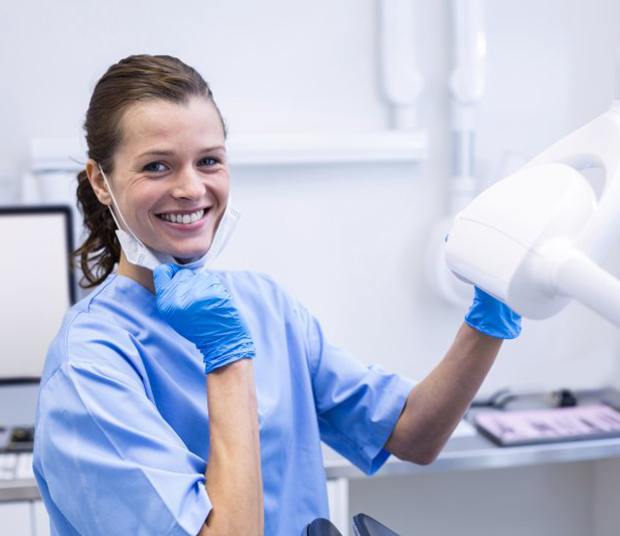 Dental hygienist smiles