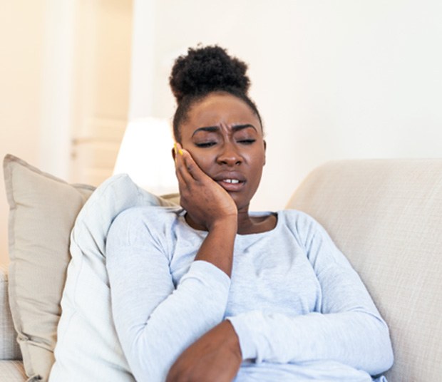 Woman with dental crowns in Dallas